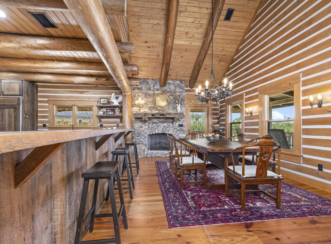 Chef's kitchen with wood beams